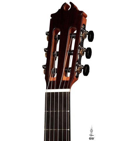 The headstock of a 2023 Hermanos Camps "GL18S" classical guitar made with spruce and Indian rosewood.