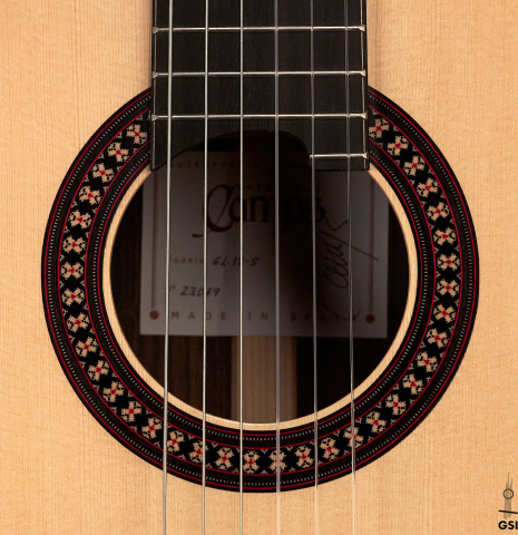 The rosette of a 2023 Hermanos Camps "GL18S" classical guitar made with spruce and Indian rosewood.