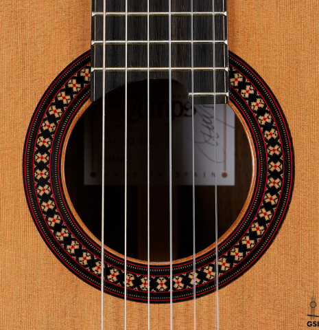 The rosette of a 2024 Hermanos Camps "CL20-C" classical guitar made of cedar and Malaysian blackwood