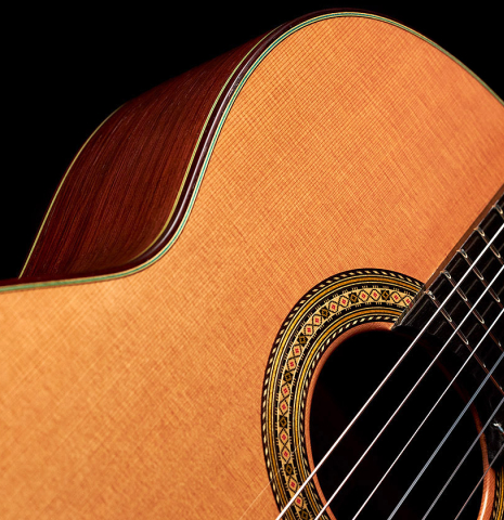 The cedar soundboard and African rosewood sides of a 2022 Vicente Carrillo "Primera Especial" classical guitar