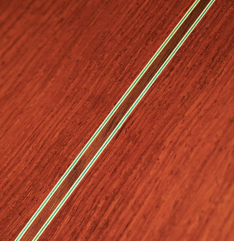 Closeup of the back and center seam purfling of a 2023 Vicente Carrillo "Primera Especial" classical guitar made with cedar top