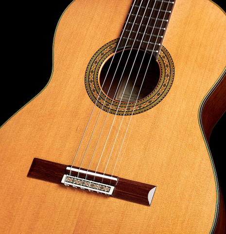 The cedar soundboard and African rosewood sides of a 2023 Vicente Carrillo "Primera Especial" classical guitar