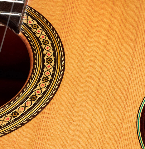 Closeup of the rosette of a 2023 Vicente Carrillo "Primera Especial" classical guitar made with cedar top