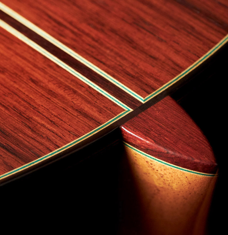 The heel of a Vicente Carrillo "Primera Especial" classical guitar made with spruce and African rosewood.
