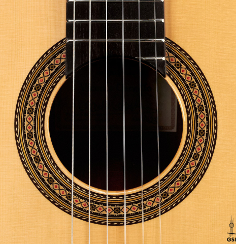 The rosette of a Vicente Carrillo "Primera Especial" classical guitar made with spruce and African rosewood.