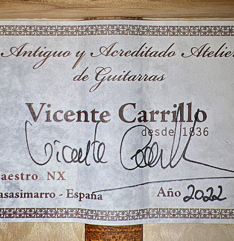 The label of a2022 Vicente Carrillo &quot;Maestro Double Top&quot; classical guitar made with spruce top and maple back and sides
