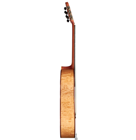 The side of a2022 Vicente Carrillo &quot;Maestro Double Top&quot; classical guitar made with spruce top and maple back and sides