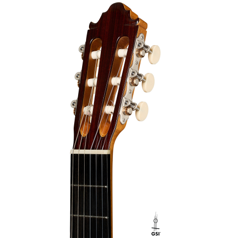The headstock of a 2024 Vicente Carrillo "Herencia" classical guitar made of cedar and Indian rosewood