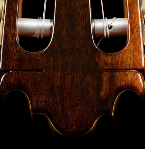The headstock veneer and tuning machine rollers of a 2025 Vicente Carrillo "Primera Especial" classical guitar made of cedar and Malaysian blackwood