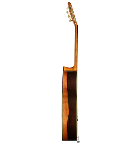 The side of a 2025 Vicente Carrillo "Primera Especial" classical guitar made of cedar and Malaysian blackwood
