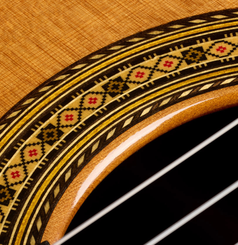 The soundboard and rosette of a 2025 Vicente Carrillo "Primera Especial" classical guitar made of cedar and Malaysian blackwood