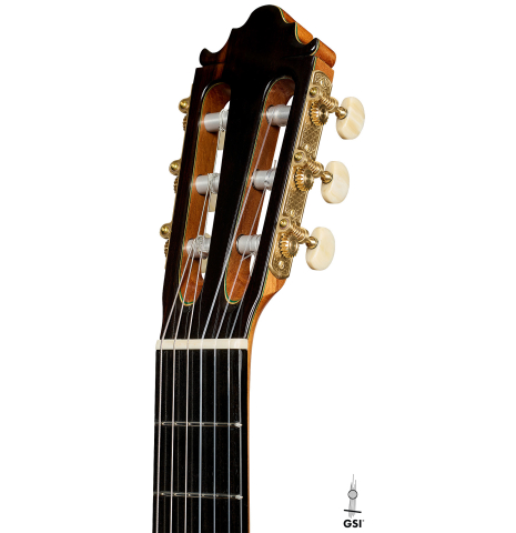 The headstock of a 2025 Vicente Carrillo "Primera Especial" classical guitar made of spruce and Malaysian blackwood