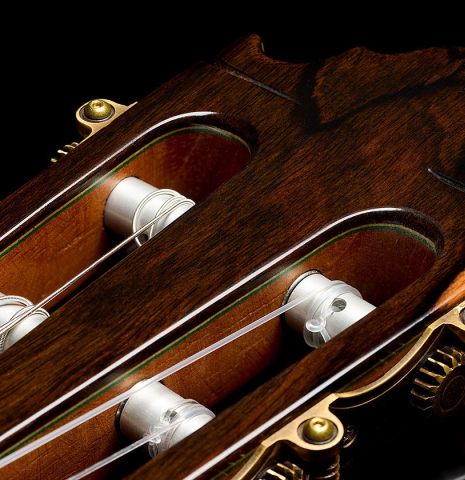 The headstock and tuning machines of a 2025 Vicente Carrillo "Primera Especial" classical guitar made of spruce and Malaysian blackwood