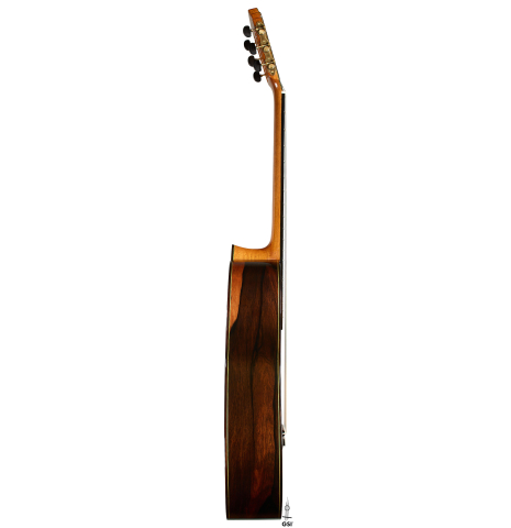 The side of a 2025 Vicente Carrillo "Primera Especial" classical guitar made of spruce and Malaysian blackwood