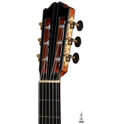 The headstock of a 2023 Gerardo Centonze classical guitar made of cedar and African rosewood