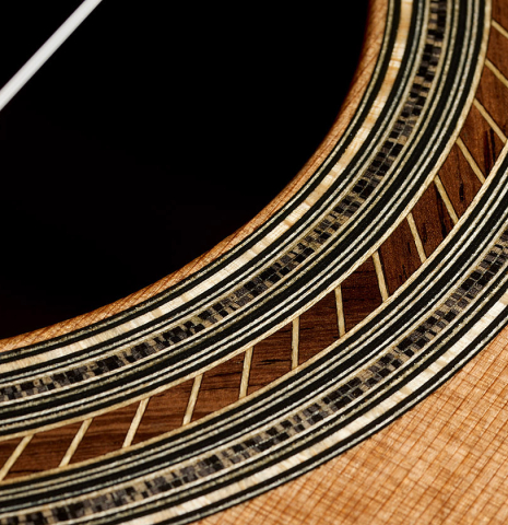 Detailed close-up of the rosette of a 2025 Gerardo Centonze classical guitar made of cedar and African rosewood