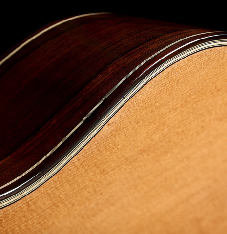 The soundboard, side, top binding and purfling of a 2025 Gerardo Centonze classical guitar made of cedar and African rosewood