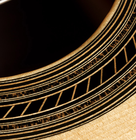 Closeup detail of the rosette of a 2024 Gerardo Centonze classical guitar made of spruce and Indian rosewood