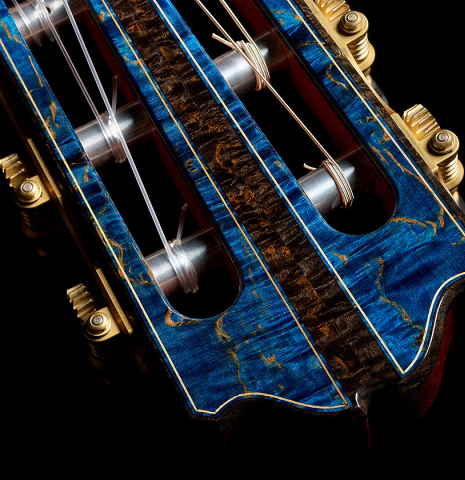 The blue head veneer and tuning machines of a 2026 Gerardo Centonze "The Blue Guitar" classical guitar made of spruce and African rosewood
