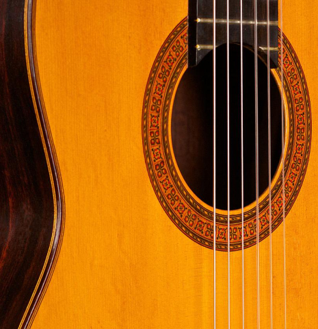 The soundboard of a 1968 Manuel de la Chica classical guitar made with spruce and CSA rosewood.