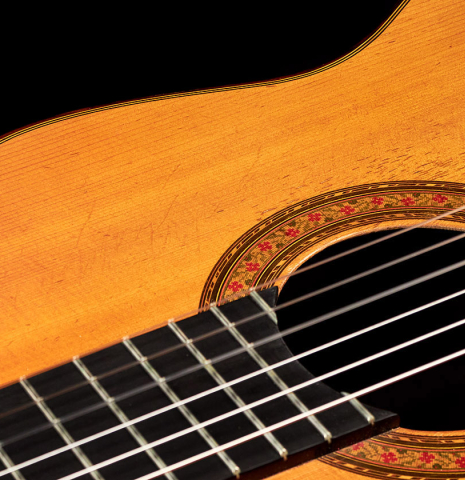 The fretboard and rosette of a 1964 Manuel de la Chica (ex Frederick Noad) classical guitar made of spruce and CSA rosewood