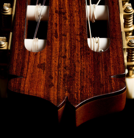 The headstock veneer and tuning machines of a 1969 Manuel de la Chica classical guitar made of cedar and CSA rosewood