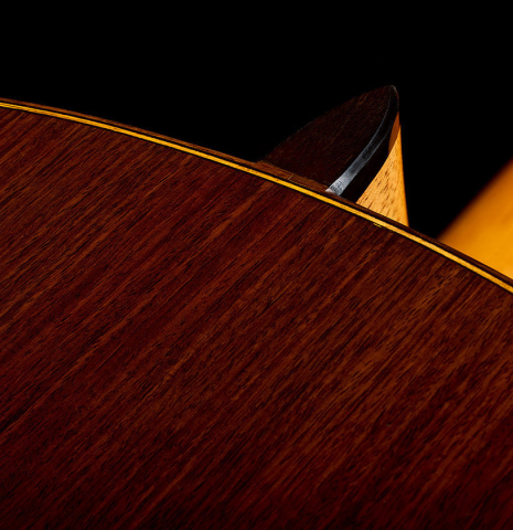 The heel, back binding and purfling of a 2025 Moonseok Choi classical guitar made of spruce and Indian rosewood