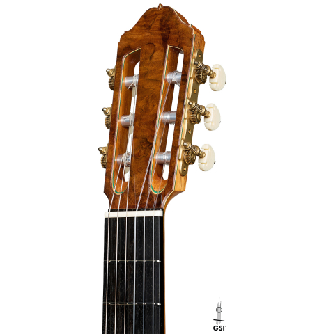 The headstock of a 2025 Moonseok Choi classical guitar made of spruce and Indian rosewood