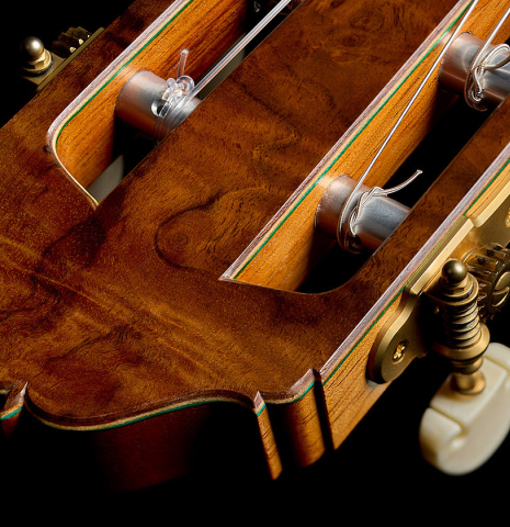 The headstock and tuning machines of a 2025 Moonseok Choi classical guitar made of spruce and Indian rosewood