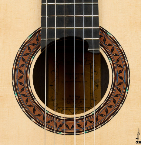 The rosette of a 2025 Moonseok Choi classical guitar made of spruce and Indian rosewood