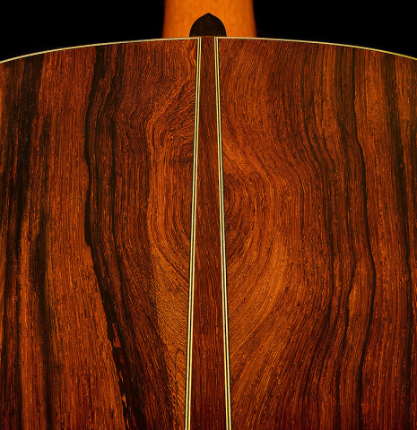 The back center seam of a 2025 Moonseok Choi classical guitar made of cedar and African rosewood