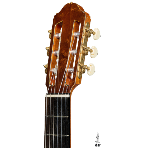 The headstock of a 2025 Moonseok Choi classical guitar made of cedar and African rosewood