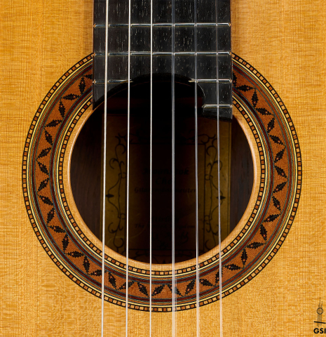 The rosette of a 2025 Moonseok Choi classical guitar made of cedar and African rosewood