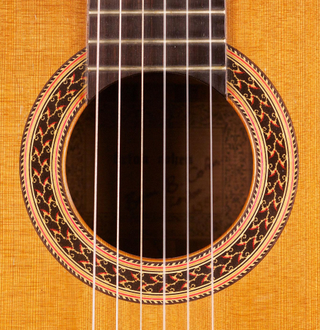 The rosette of a 1982 Brian Cohen classical guitar made with cedar and CSA rosewood