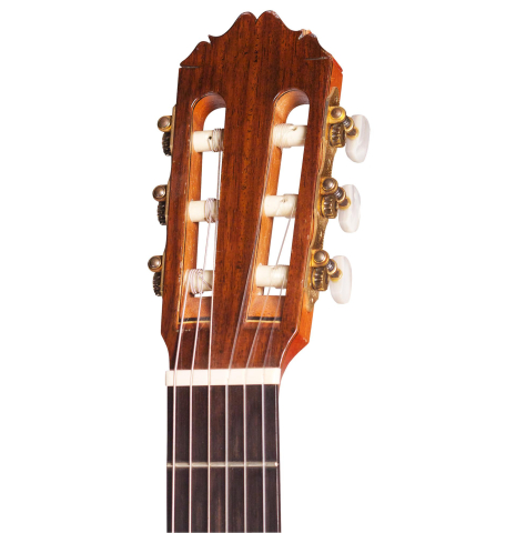 The headstock and machine heads of a 1982 Brian Cohen classical guitar made with cedar and CSA rosewood