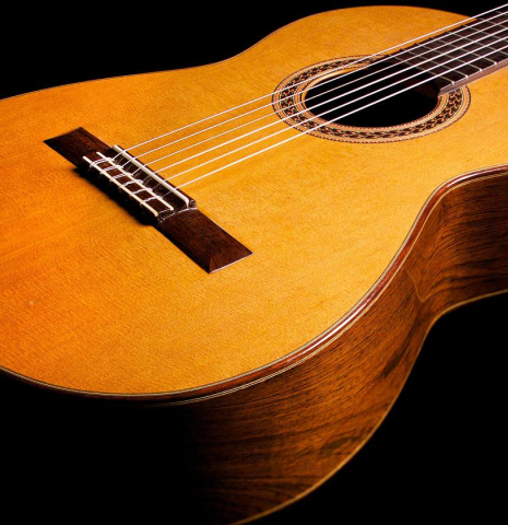 The soundboard and side of a 1982 Brian Cohen classical guitar made with cedar and CSA rosewood