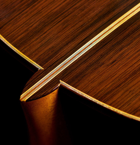 The heel and back of a 2001 Brian Cohen classical guitar made with spruce and CSA rosewood