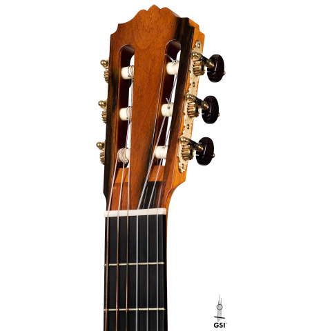 The headstock and machine heads of a 2001 Brian Cohen classical guitar made with spruce and CSA rosewood
