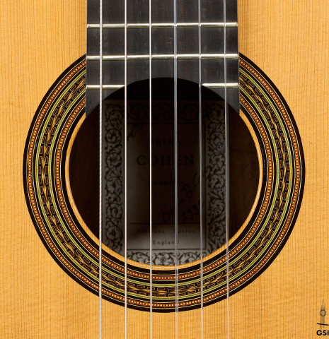 The rosette of a 1990 Brian Cohen classical guitar made of spruce and Indian rosewood