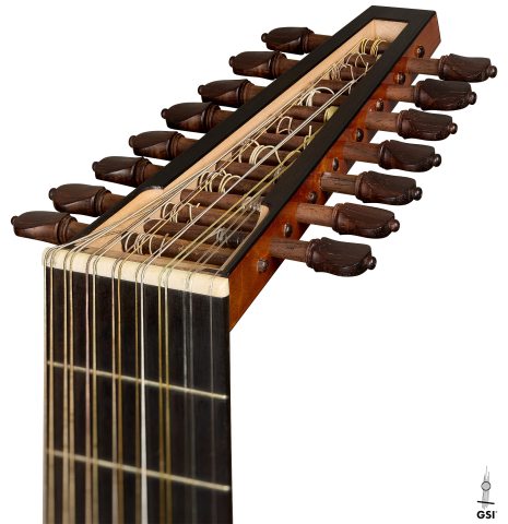 The tuning peg headstock of a 1994 Brian Cohen "8-Course Renaissance Lute" made of spruce and maple
