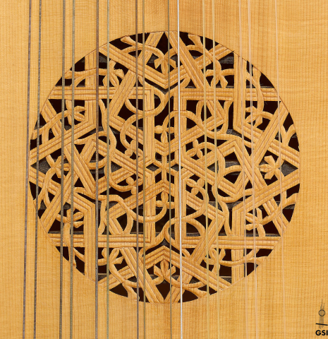 The "rose" rosette of a 1994 Brian Cohen "8-Course Renaissance Lute" made of spruce and maple
