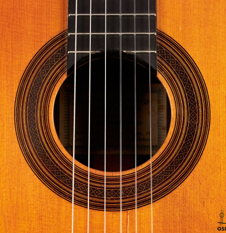 The rosette of a 1934 Enrique Coll classical guitar made of spruce and CSA rosewood