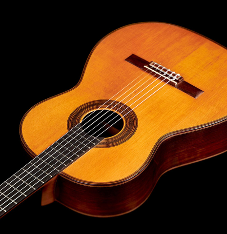 The soundboard of a 1934 Enrique Coll classical guitar made of spruce and CSA rosewood