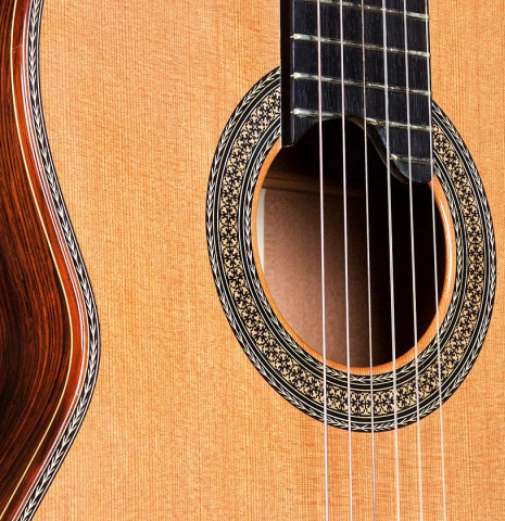 The soundboard and rosette of a 2003 Manuel Contreras II "Double Top" CD/CSAR (ex Pepe Romero) classical guitar