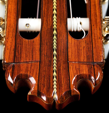 The headstock and tuning machines of a 2009 Manuel Contreras II "Especial" classical guitar made of spruce and African rosewood
