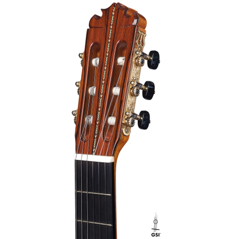 The headstock of a 2005 Manuel Contreras II "Double Top" classical guitar made of spruce and CSA rosewood