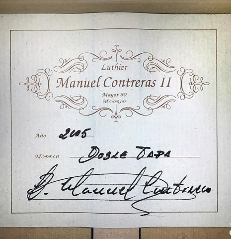The label of a 2005 Manuel Contreras II "Double Top" classical guitar made of spruce and CSA rosewood