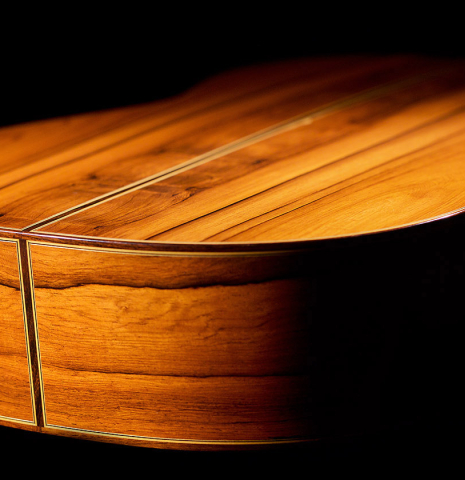 The lower bout of a 2009 Manuel Contreras II "Double Top" classical guitar made with cedar top and CSA rosewood back and sides.
