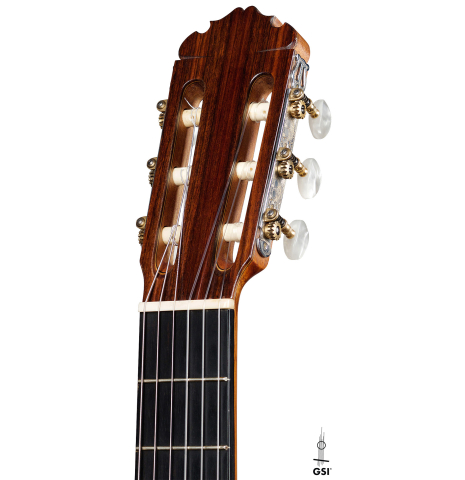 The headstock and machine heads of a 1966 Manuel Contreras classical guitar made with cedar and Indian rosewood