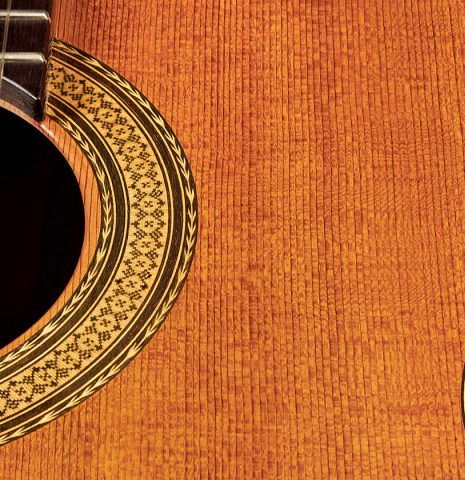 The soundboard and rosette of a 1988 Manuel Contreras "Double Top" classical guitar made with cedar and CSA rosewood.